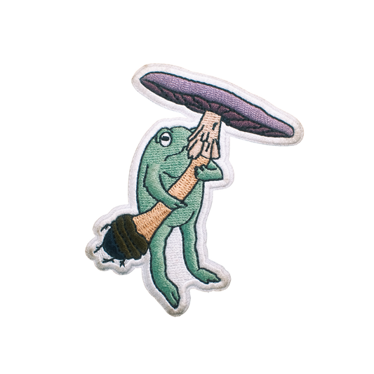 FROG HOLDING HIS MUSHROOM PATCH